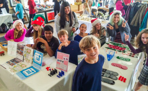 Eighth Grade Entrepreneur Students at Holiday Boutique Table